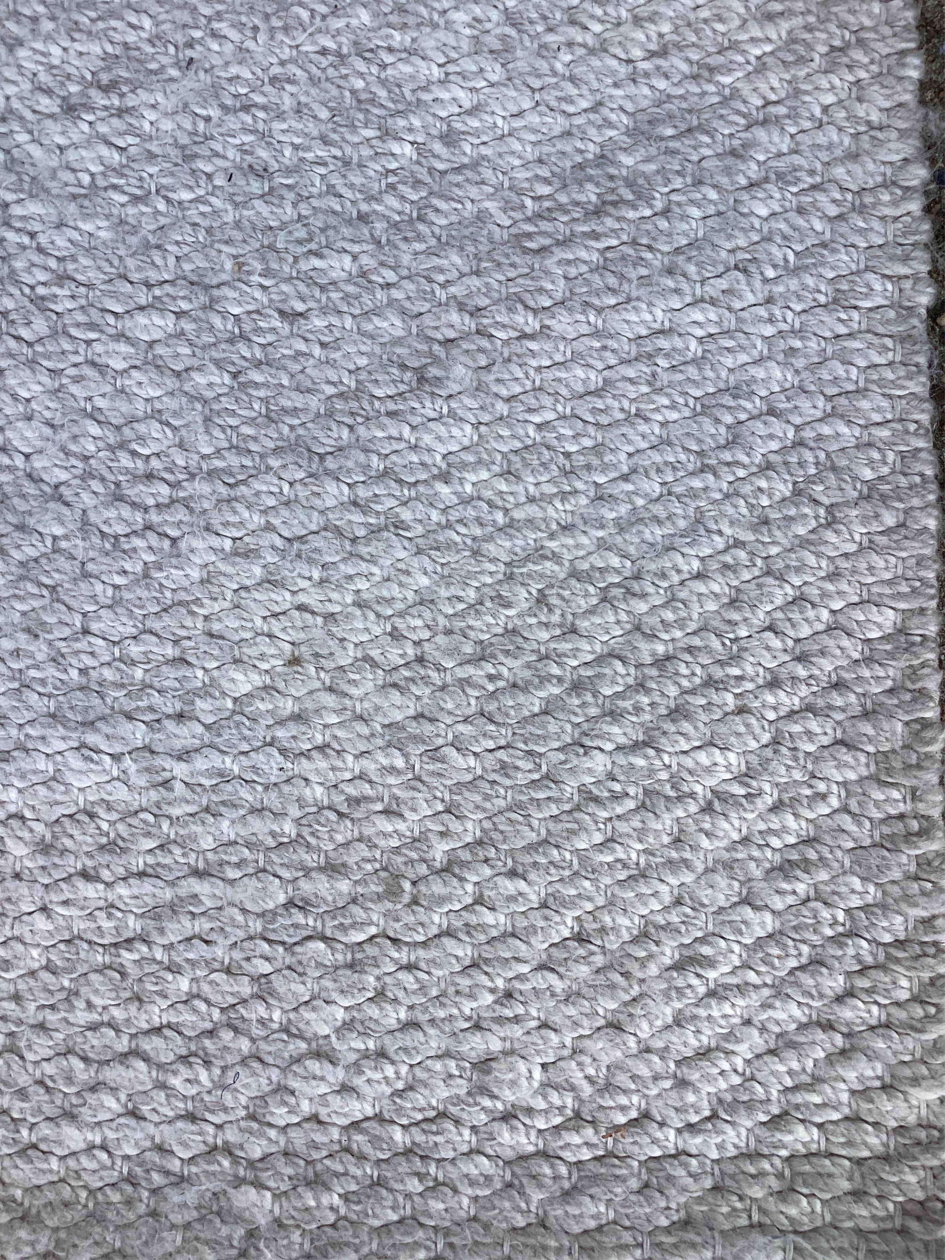 A Contemporary “Argile” wool carpet 300 x 200cm